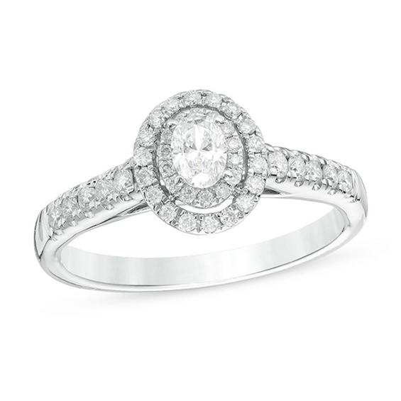 1/2 CT. T.w. Oval Diamond Double Frame Engagement Ring in 14K White Gold
