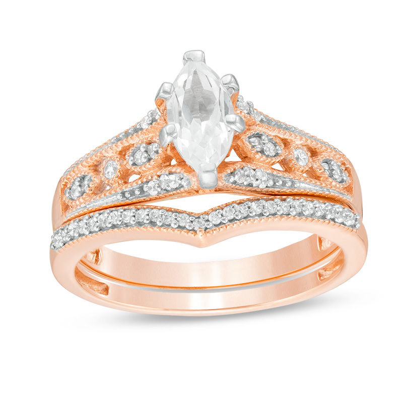 Lab-Created Marquise White Sapphire and 1/5 CT. T.W. Diamond Bridal Set in 10K Rose Gold