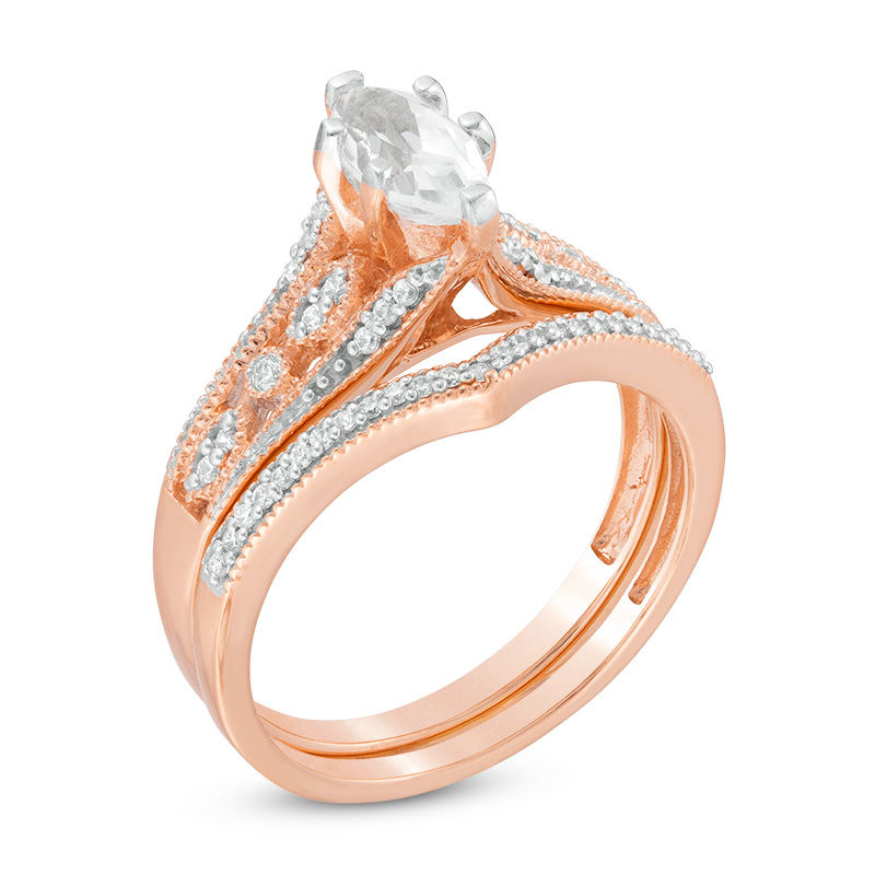 Lab-Created Marquise White Sapphire and 1/5 CT. T.W. Diamond Bridal Set in 10K Rose Gold