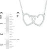 Thumbnail Image 1 of 1/8 CT. T.W. Diamond Interlocking Hearts Necklace in 10K White Gold