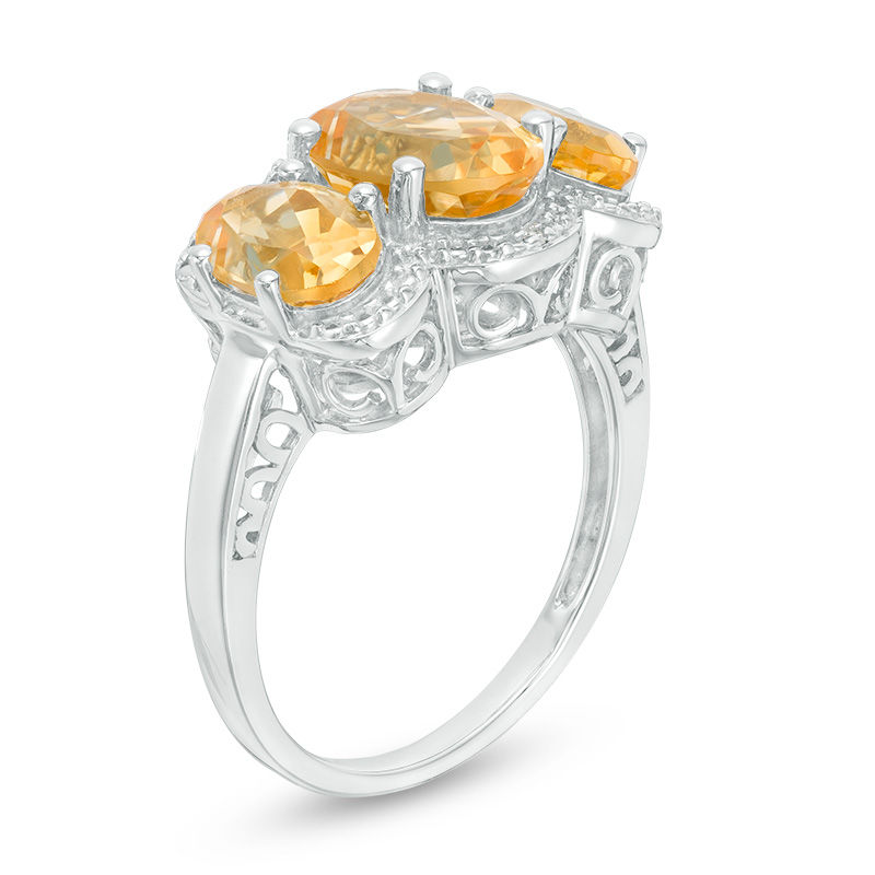 Oval Citrine and Diamond Accent Three Stone Frame Ring in Sterling Silver