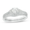 Thumbnail Image 1 of Lab-Created White Sapphire and 1/10 CT. T.W. Diamond Tri-Sides Bridal Set in Sterling Silver
