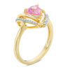 Thumbnail Image 1 of 6.0mm Trillion-Cut Lab-Created Pink Sapphire and 1/10 CT. T.W. Diamond Swirl Frame Ring in 10K Gold