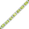 Thumbnail Image 0 of Oval Peridot and Diamond Accent Tennis Bracelet in Sterling Silver - 7.25"