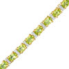 Thumbnail Image 0 of Oval Peridot and Diamond Accent Tennis Bracelet in Sterling Silver and 14K Gold Plate - 7.25"