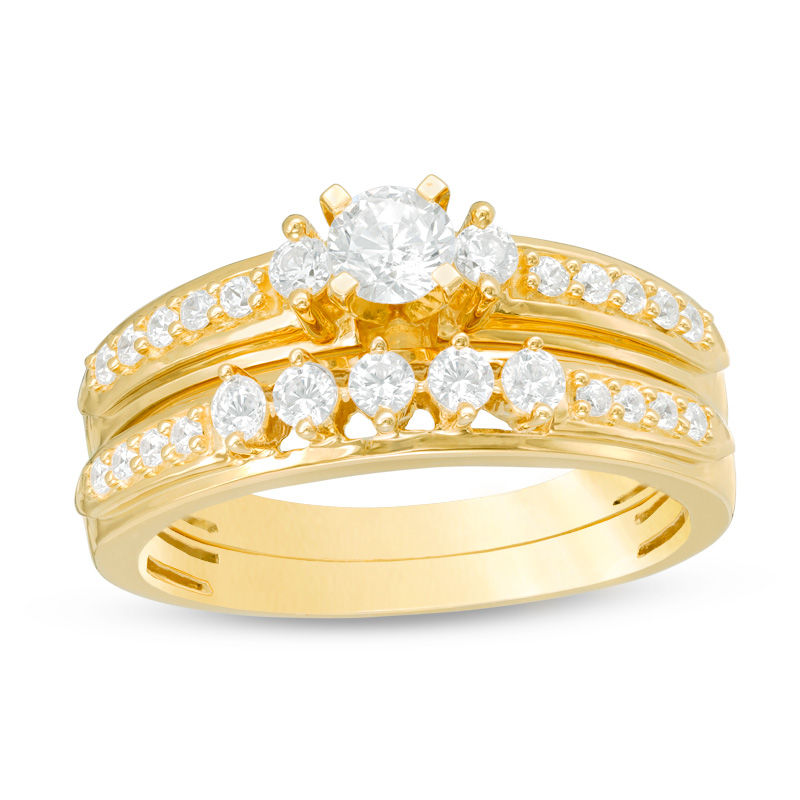 5/8 CT. T.W. Diamond Three Stone Bridal Set in 14K Gold