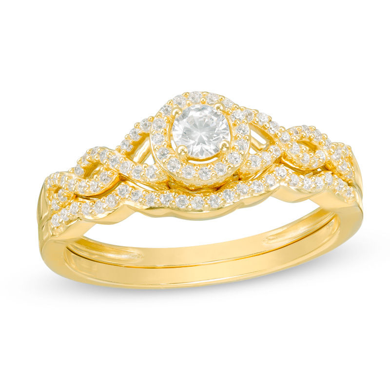 Main Image 1 of 3/8 CT. T.W. Diamond Frame Twist Bridal Set in 10K Gold