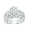 Thumbnail Image 1 of 5/8 CT. T.W. Composite Diamond Oval Frame Twist Engagement Ring in 14K White Gold