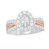 Thumbnail Image 1 of Celebration Ideal 1-1/5 CT. T.W. Oval Certified Diamond Frame Twist Engagement Ring in 14K Two-Toned Gold (I/I1)