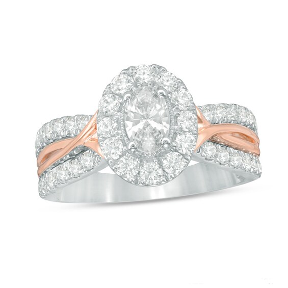 Celebration Ideal 1-1/5 CT. T.w. Oval Certified Diamond Frame Twist Engagement Ring in 14K Two-Toned Gold (I/I1)