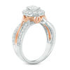 Thumbnail Image 2 of Celebration Ideal 1-1/5 CT. T.W. Oval Certified Diamond Frame Twist Engagement Ring in 14K Two-Toned Gold (I/I1)