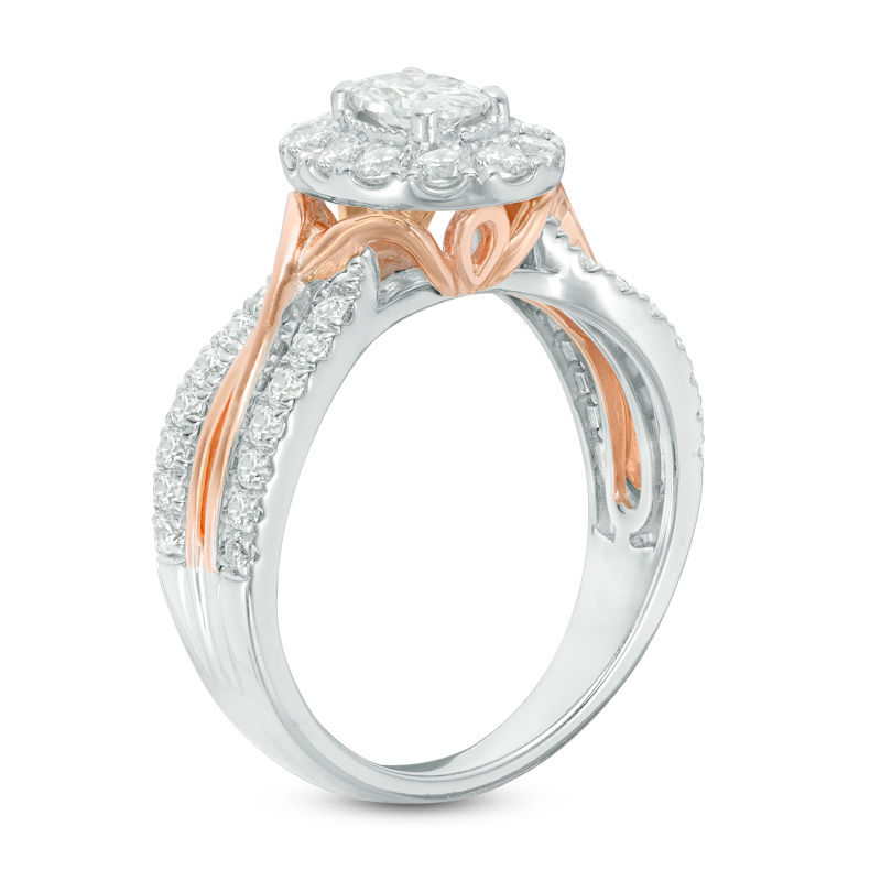 Celebration Ideal 1-1/5 CT. T.W. Oval Diamond Frame Twist Engagement Ring in 14K Two-Toned Gold (I/I1)