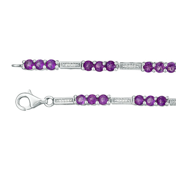 Amethyst and 1/10 CT. T.W. Diamond Three Stone Station Bracelet in 10K White Gold - 7.5" Amethyst and 1/10 CT. T.W. Diamond Three Stone Station Bracelet in 10K White Gold - 7.5"