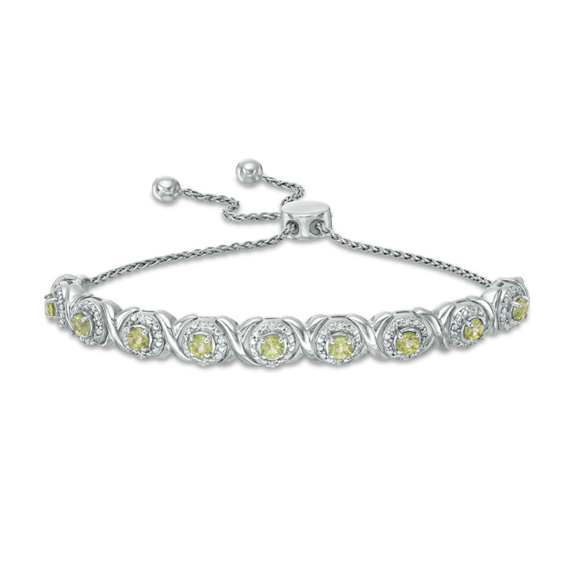 Main Image 1 of Peridot and 1/10 CT. T.W. Diamond Frame Bolo Bracelet in Sterling Silver - 9.5"