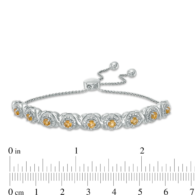Main Image 2 of Citrine and 1/10 CT. T.W. Diamond Frame Bolo Bracelet in Sterling Silver - 9.5"