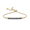 Thumbnail Image 1 of Lab-Created Blue Sapphire Nine Stone Bar Bolo Bracelet in 10K Gold - 9.5"