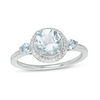 Thumbnail Image 0 of Aquamarine and 1/6 CT. T.W. Diamond Frame Three Stone Ring in Sterling Silver