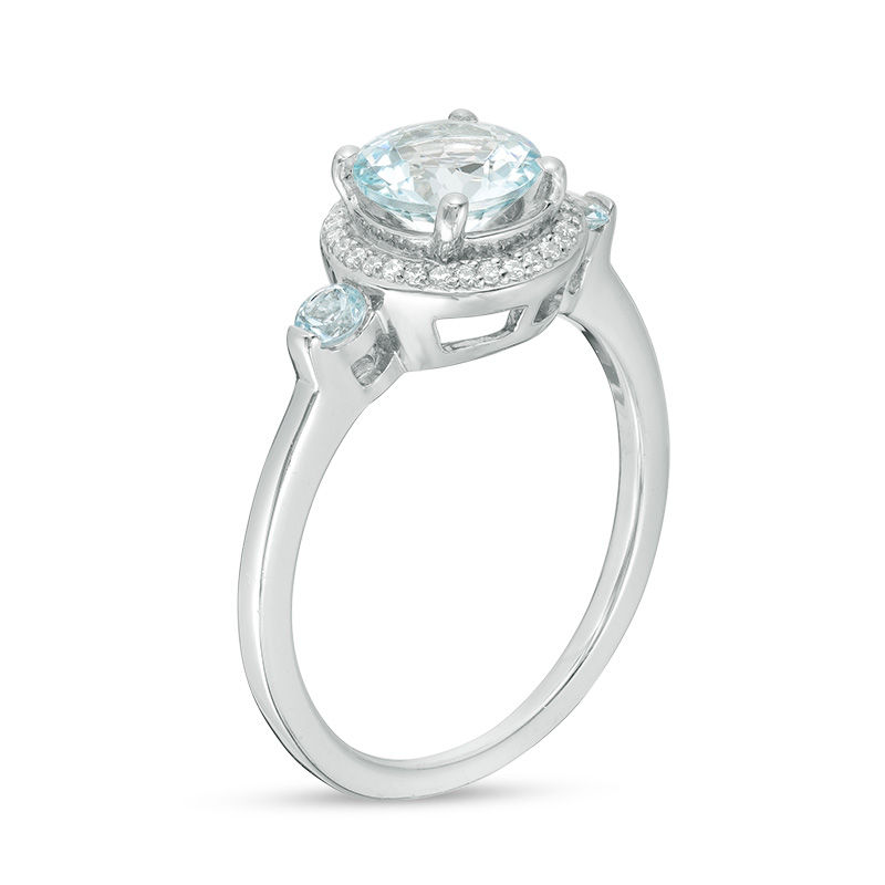 Aquamarine and 1/6 CT. T.W. Diamond Frame Three Stone Ring in Sterling Silver