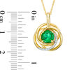 Thumbnail Image 1 of 7.0mm Lab-Created Emerald and Diamond Accent Love Knot Pendant in 10K Gold