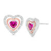 Thumbnail Image 0 of 4.0mm Lab-Created Ruby and Diamond Accent Heart Stud Earrings in Sterling Silver and 10K Rose Gold