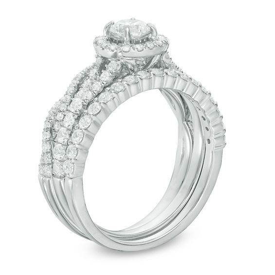 1-1/4 CT. T.w. Diamond Frame Three Piece Bridal Set in 14K White Gold