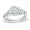 Thumbnail Image 0 of 1/2 CT. T.W. Diamond Swirl Bypass Frame Bridal Set in 10K White Gold