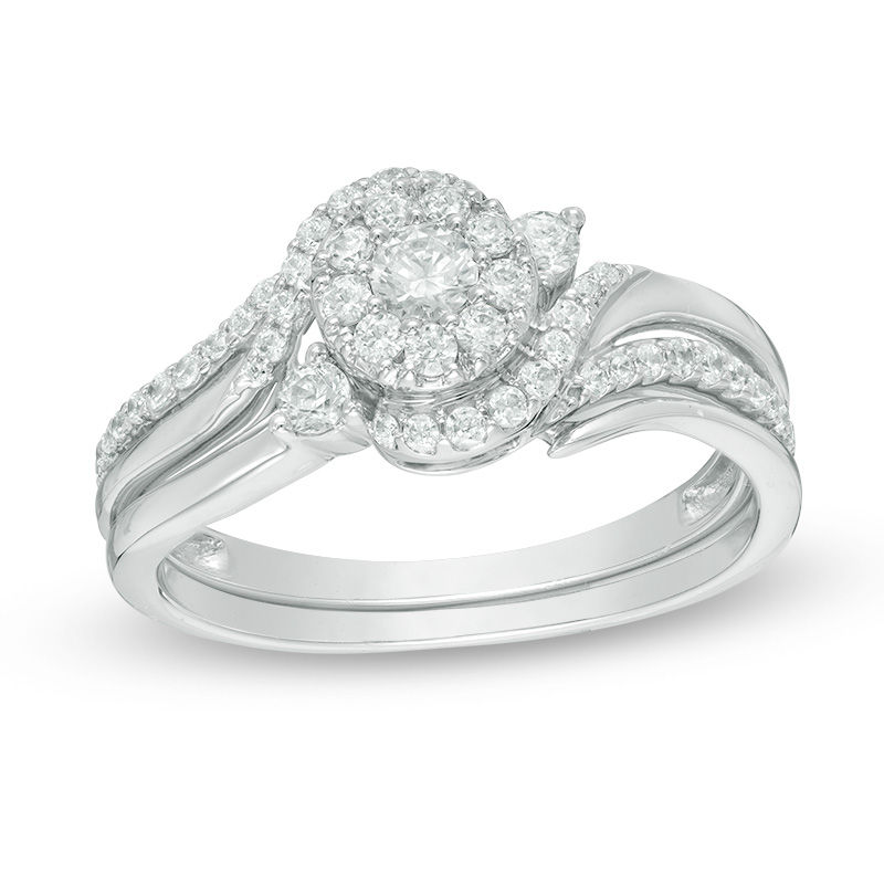 1/2 CT. T.W. Diamond Swirl Bypass Frame Bridal Set in 10K White Gold