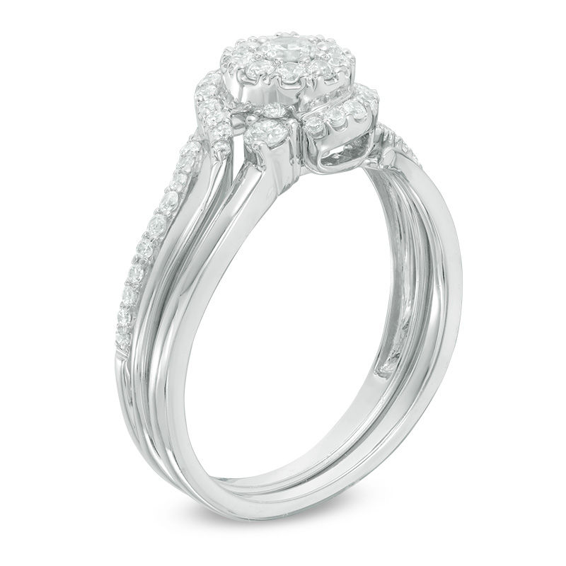 1/2 CT. T.W. Diamond Swirl Bypass Frame Bridal Set in 10K White Gold