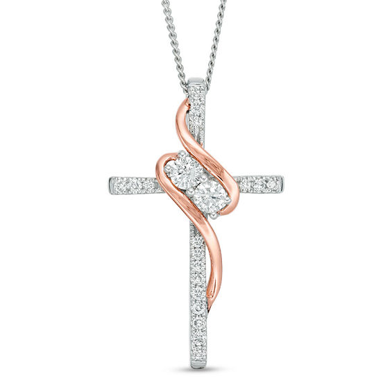 Ever UsÂ® 1/3 CT. T.w. Diamond Two-Stone Swirl Cross Pendant in 14K Two-Tone Gold - 19"