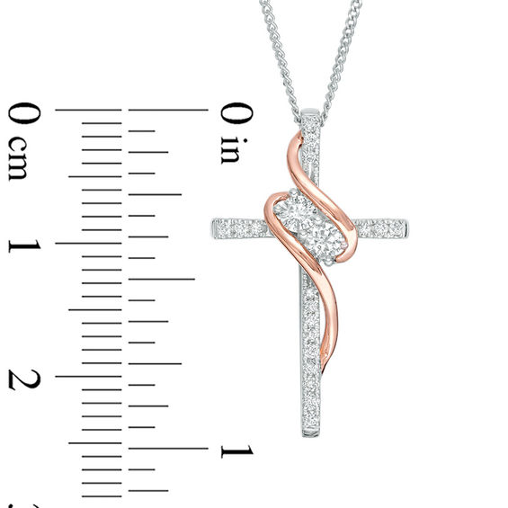 Ever UsÂ® 1/3 CT. T.w. Diamond Two-Stone Swirl Cross Pendant in 14K Two-Tone Gold - 19"