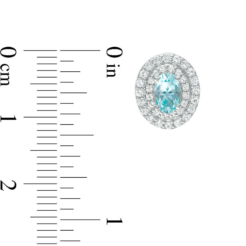 Main Image 2 of Oval Blue and White Topaz Frame Stud Earrings in Sterling Silver