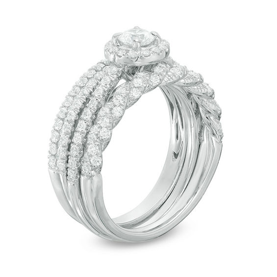 1-1/4 CT. T.w. Diamond Frame Three Piece Bridal Set in 14K White Gold