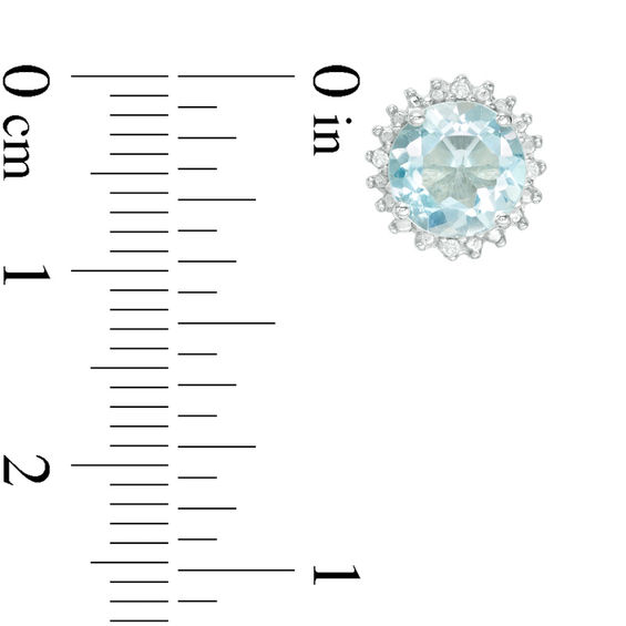 7.0mm Blue Topaz and Diamond Accent Starburst Frame Stud Earrings in Sterling Silver