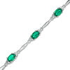 Thumbnail Image 1 of Oval Lab-Created Emerald and Diamond Accent Bracelet in Sterling Silver - 7.25"