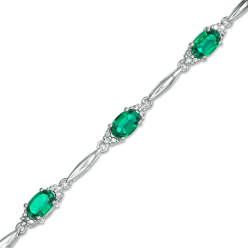 Main Image 1 of Oval Lab-Created Emerald and Diamond Accent Bracelet in Sterling Silver - 7.25"