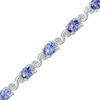 Thumbnail Image 0 of Oval Tanzanite and Diamond Accent "S" Bracelet in Sterling Silver - 7.25"