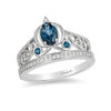 Thumbnail Image 1 of Enchanted Disney Cinderella Oval London Blue Topaz and 1/10 CT. T.W. Diamond Carriage Ring in Sterling Silver - Size 7