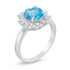 Thumbnail Image 1 of 8.0mm Swiss Blue Topaz and Lab-Created White Sapphire Swirl Frame Ring in Sterling Silver