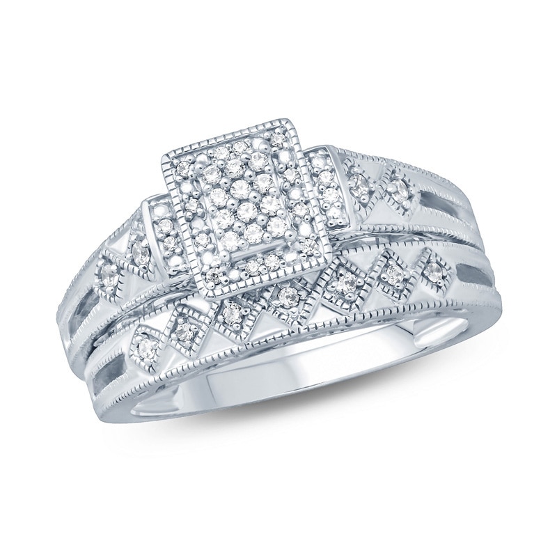 1/5 CT. T.W. Emerald-Shaped Multi-Diamond Frame Geometric Shank Bridal Set in Sterling Silver
