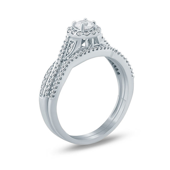 1/2 CT. T.w. Diamond Frame Twist Bridal Set in 10K White Gold