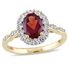 Thumbnail Image 0 of Oval Garnet, White Topaz and Diamond Accent Frame Ring in 14K Gold