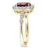 Thumbnail Image 1 of Oval Garnet, White Topaz and Diamond Accent Frame Ring in 14K Gold