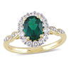 Thumbnail Image 0 of Oval Lab-Created Emerald, White Topaz and Diamond Accent Frame Ring in 14K Gold