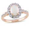 Thumbnail Image 0 of Oval Opal, White Topaz and Diamond Accent Frame Ring in 14K Rose Gold