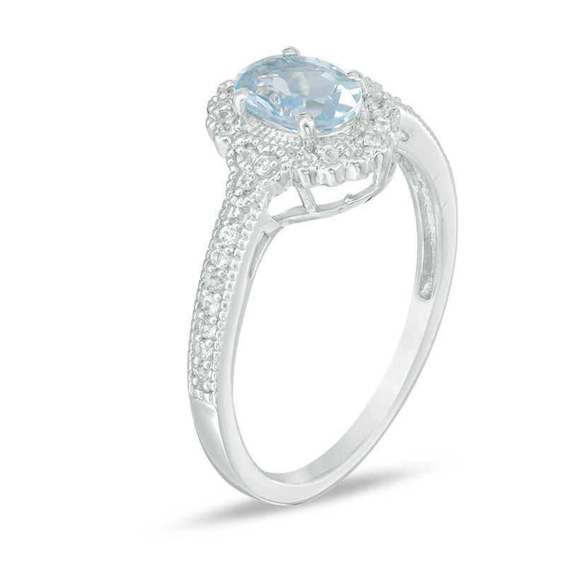 Main Image 2 of Oval Aquamarine and 1/8 CT. T.W. Diamond Frame Vintage-Style Ring in 10K White Gold