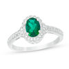 Thumbnail Image 0 of Oval Lab-Created Emerald and 1/8 CT. T.W. Diamond Frame Vintage-Style Ring in 10K White Gold