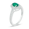 Thumbnail Image 1 of Oval Lab-Created Emerald and 1/8 CT. T.W. Diamond Frame Vintage-Style Ring in 10K White Gold