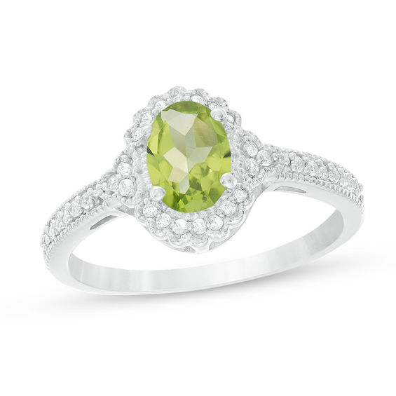 Oval Peridot and 1/8 CT. T.w. Diamond Frame Vintage-Style Ring in 10K White Gold