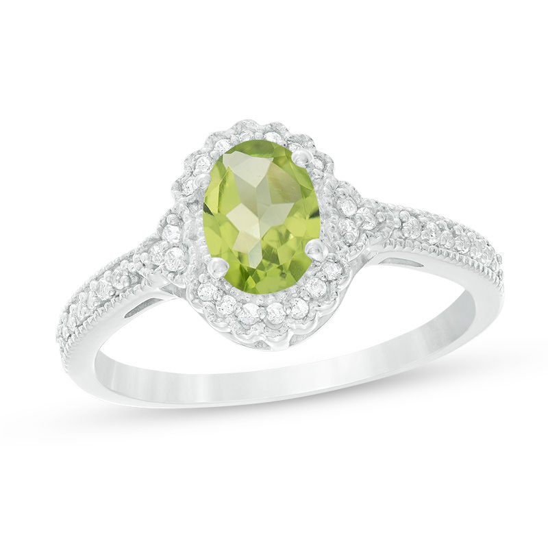 Oval Peridot and 1/8 CT. T.W. Diamond Frame Vintage-Style Ring in 10K White Gold