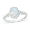 Thumbnail Image 0 of Oval Lab-Created Opal and 1/8 CT. T.W. Diamond Frame Vintage-Style Ring in 10K White Gold